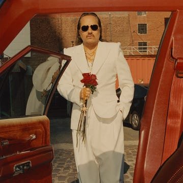 willy chavarria in a white suit